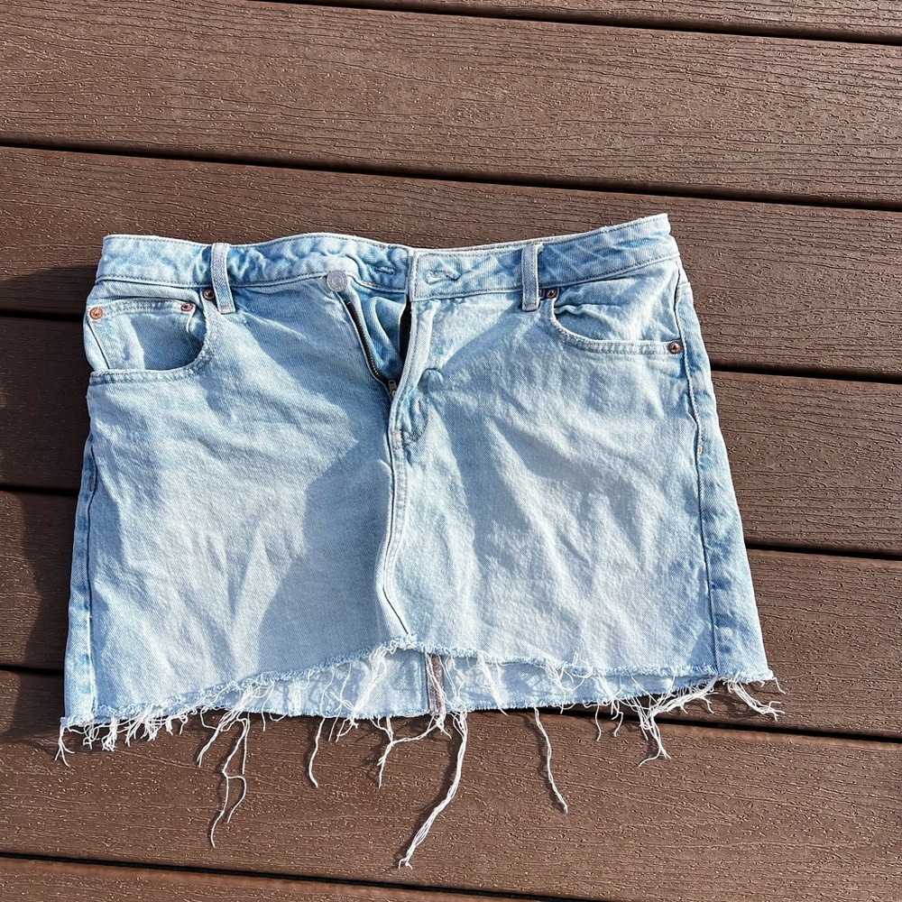 American Eagle Outfitters Light Blue Denim Mini Skirt with Frayed Edge